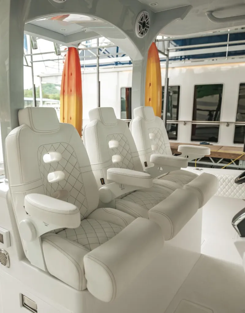 Slide: The Image of Luxurious seating on the 2023 HCB 39 Speciale boat with white leather upholstery. - 23