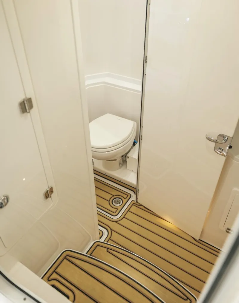 Slide: The Image of 2023 HCB 39 Speciale boat bathroom with modern design and wooden flooring. - 27