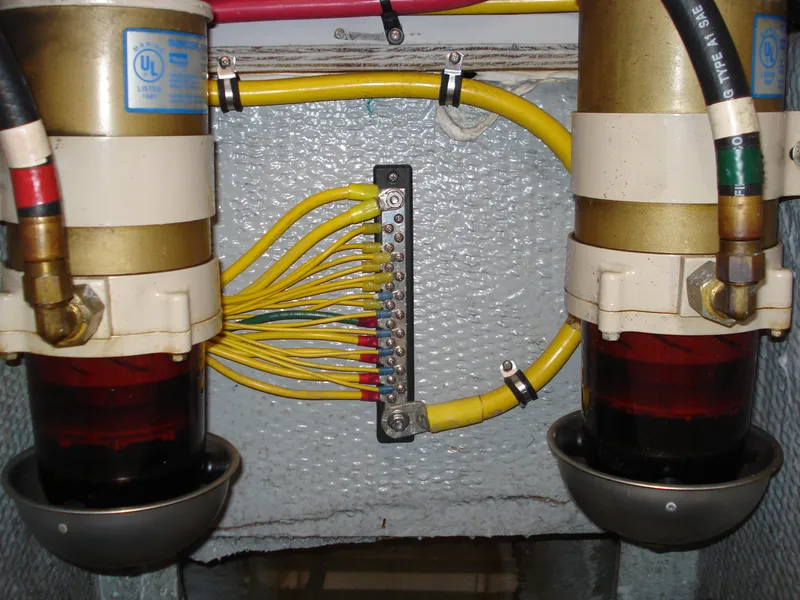 Slide: The Image of Engine room wiring and filters on a 2000 Silverton 392 Motor Yacht. - 36