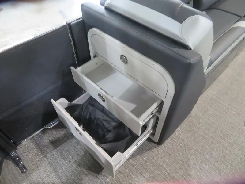 Slide: The Image of 2023 Crest Caribbean RS 250 SLS CP3 boat interior storage drawers. - 12