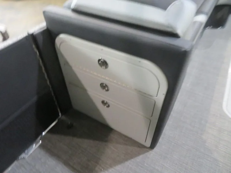 Slide: The Image of 2023 Crest Caribbean RS 250 SLS CP3 boat interior storage compartment. - 14