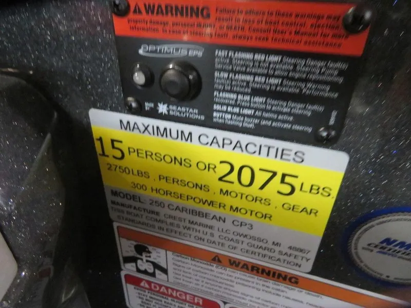 Slide: The Image of 2023 Crest Caribbean RS 250 SLS CP3 maximum capacities label, 15 persons or 2075 lbs. - 15
