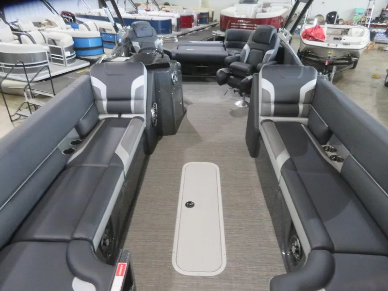 Slide: The Image of 2023 Crest Caribbean RS 250 SLS CP3 pontoon boat interior with gray seating. - 5