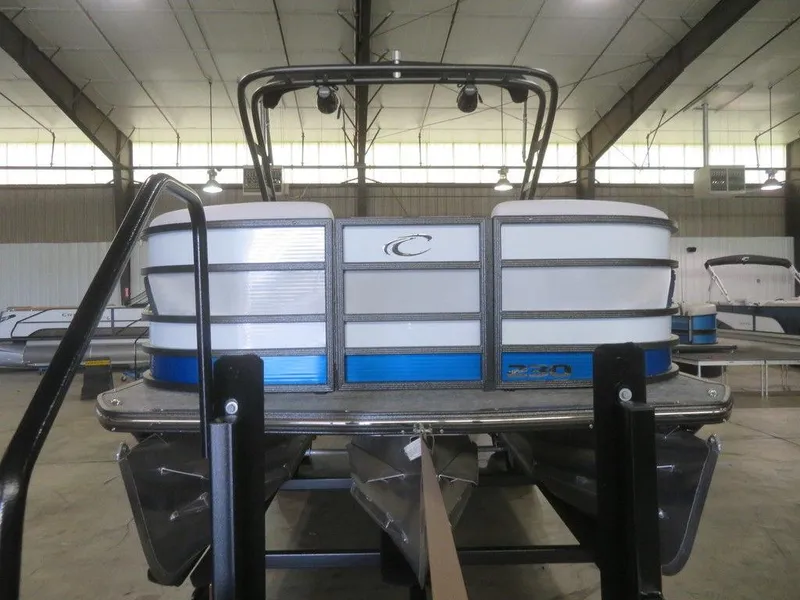 Slide: The Image of 2023 Crest Caribbean RS 230 SLC CP3 pontoon boat in indoor storage. - 11