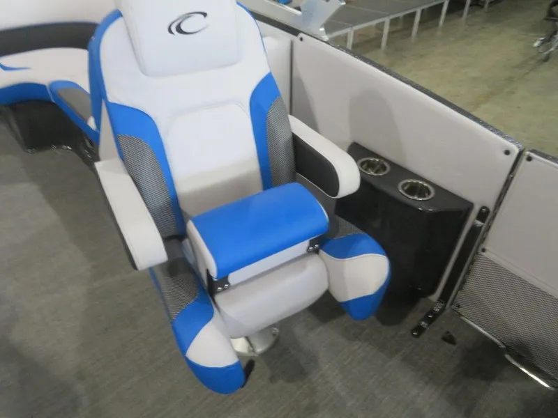 Slide: The Image of 2023 Crest Caribbean RS 230 SLC CP3 boat seat with blue and white upholstery. - 16