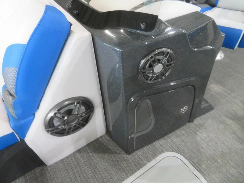 Slide: The Image of 2023 Crest Caribbean RS 230 SLC CP3 boat interior with speakers and seating. - 17