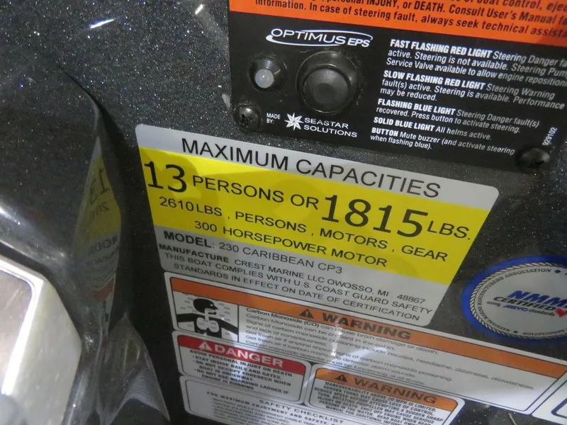 Slide: The Image of 2023 Crest Caribbean RS 230 SLC CP3 maximum capacities label, 13 persons or 1815 lbs, 300 HP motor. - 23