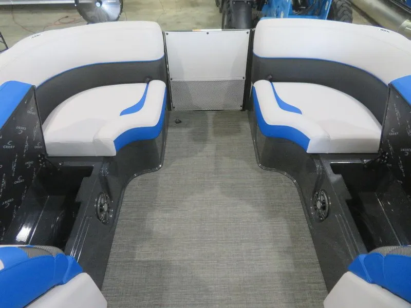 Slide: The Image of 2023 Crest Caribbean RS 230 SLC CP3 boat interior with blue and white seating. - 26