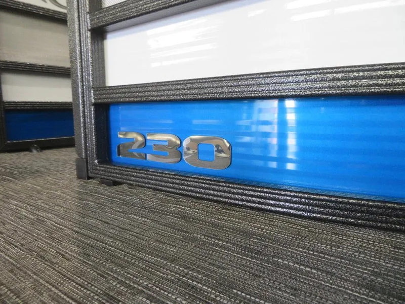 Slide: The Image of 2023 Crest Caribbean RS 230 SLC CP3 boat detail with 230 emblem. - 5