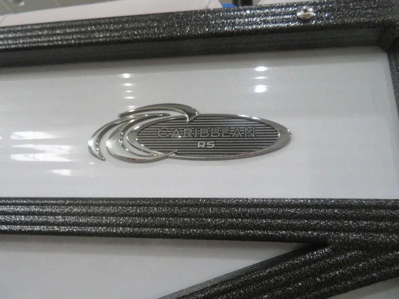 Slide: The Image of 2023 Crest Caribbean RS 230 SLC CP3 logo on boat exterior. - 7