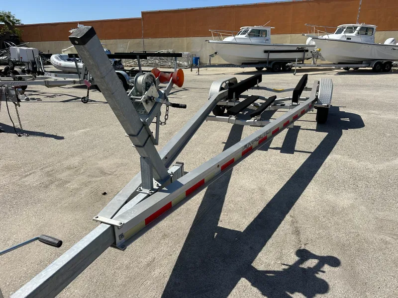 Slide: The Image of 2021 Edgewater 262CC center console boat interior with dual seats and storage compartment. - 18