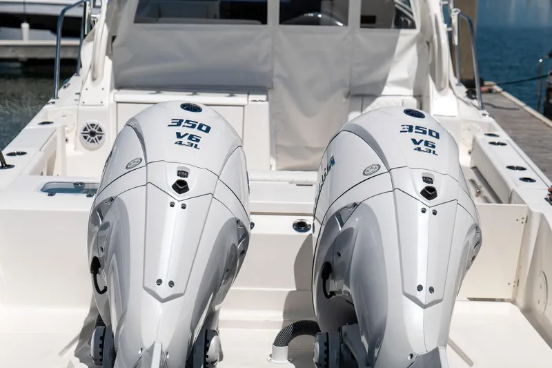 Slide: The Image of 2024 Pursuit OS 325 Offshore boat with dual 350 V6 engines. - 15