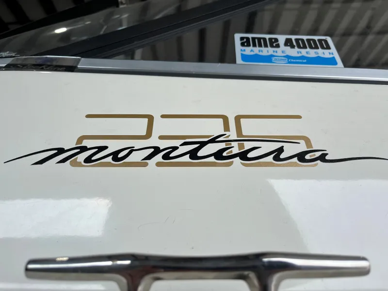 Slide: The Image of 1997 Monterey 236 Montura boat logo and AME 4000 Marine Resin sticker. - 20