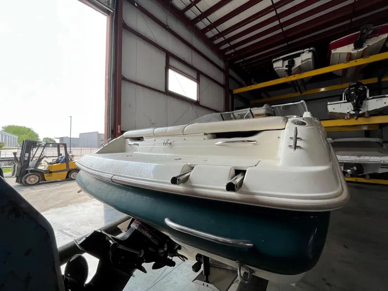 Slide: The Image of 1997 Monterey 236 Montura boat in storage facility. - 8