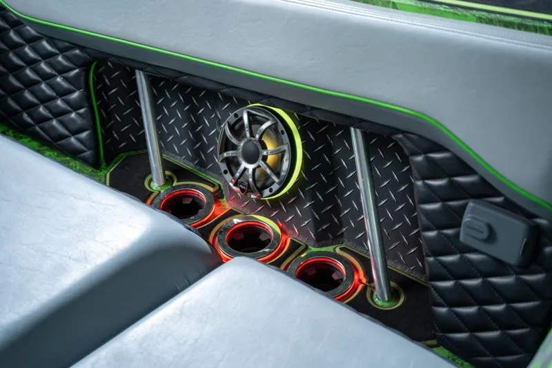 Slide: The Image of 2018 Pavati AL26 boat interior with illuminated cup holders and speaker. - 5