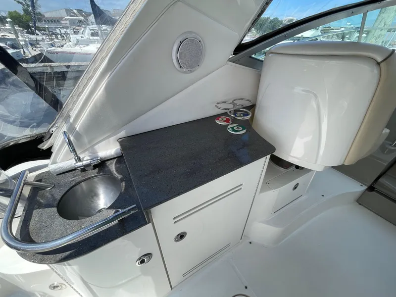 Slide: The Image of Sea Ray 350 Sundancer 2012 boat interior with sink and counter. - 11