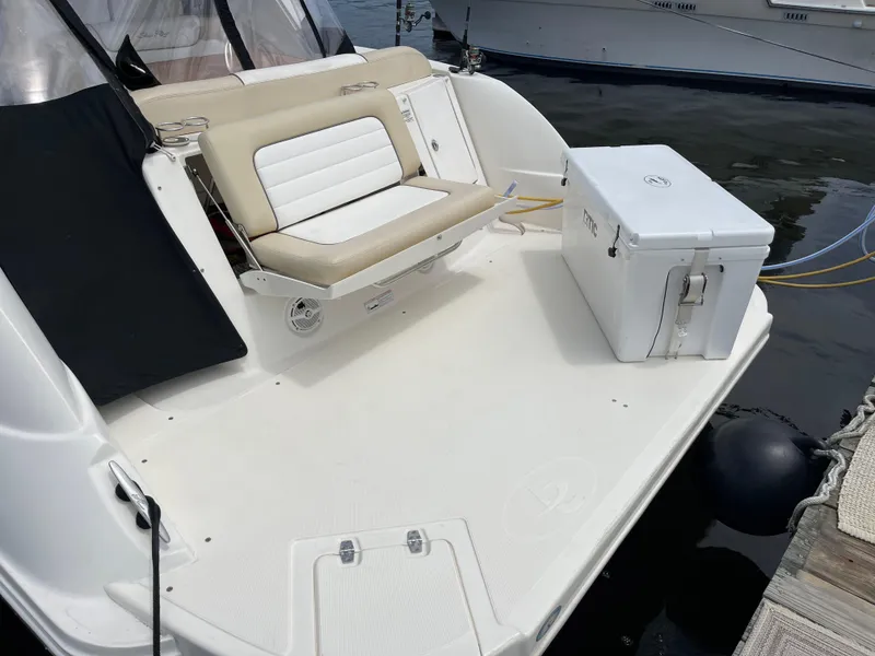 Slide: The Image of 2012 Sea Ray 350 Sundancer boat with swim platform and seating. - 13
