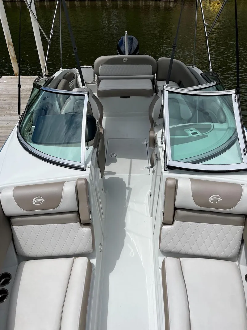 Slide: The Image of 2023 Crownline E 235 XS boat interior with luxurious seating and modern design. - 15