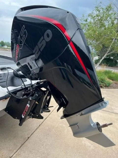 Slide: The Image of 2023 Ranger Z521R boat with a powerful outboard motor. - 3