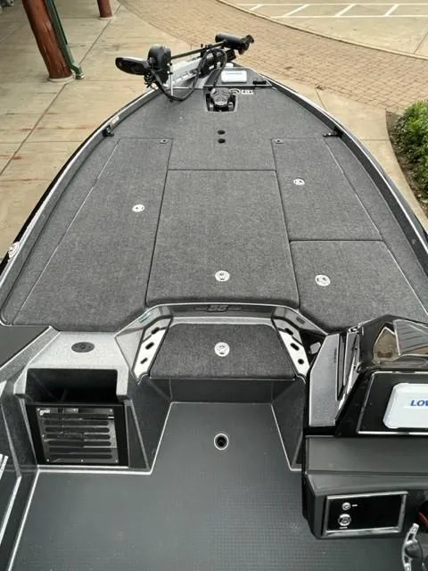 Slide: The Image of 2023 Ranger Z521R fishing boat deck with storage compartments and electronics. - 6