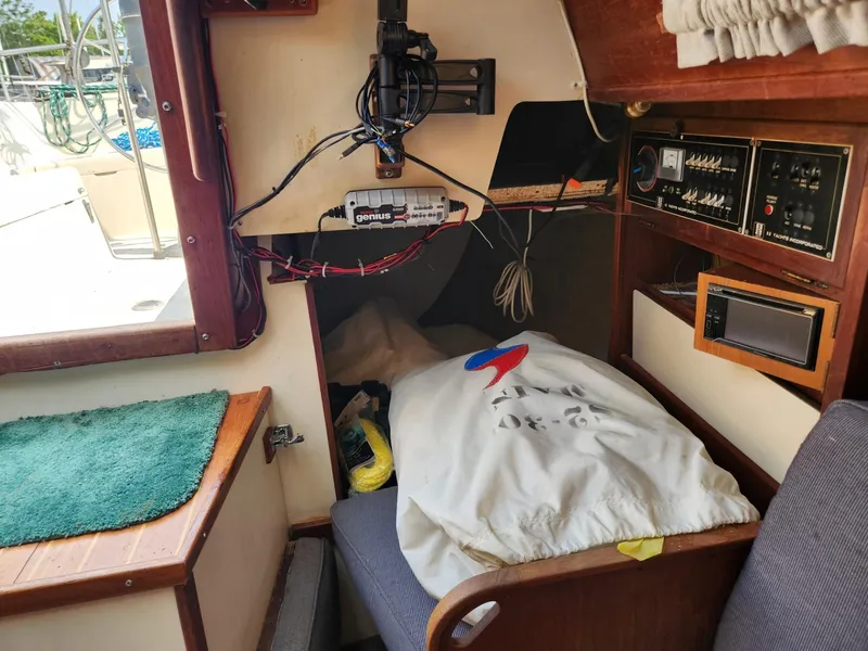 Slide: The Image of Interior of 1984 S2 9.2 sailboat cabin with electronics and sleeping area. - 33