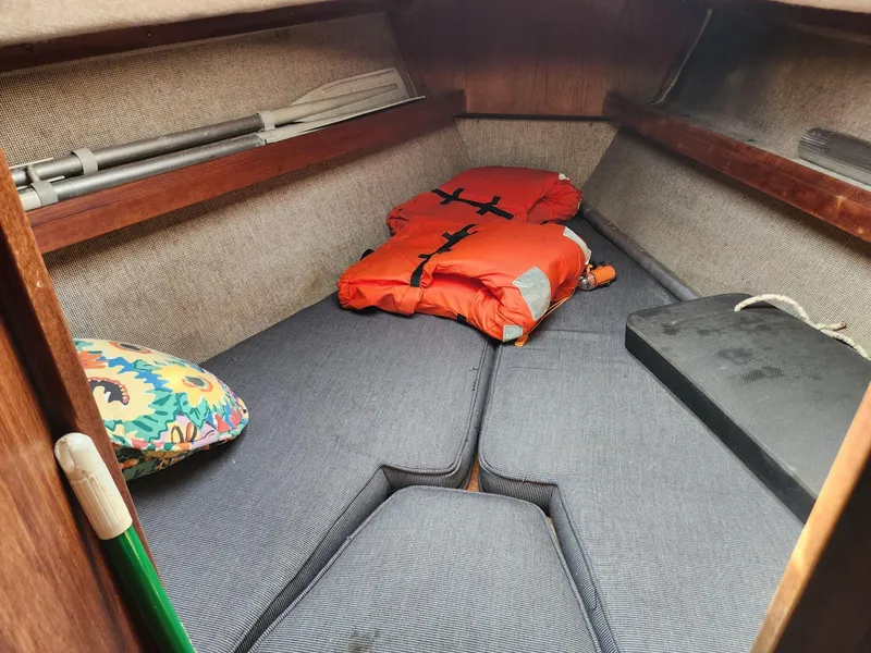 Slide: The Image of Interior cabin of 1984 S2 9.2 sailboat with life jackets and cushions. - 37