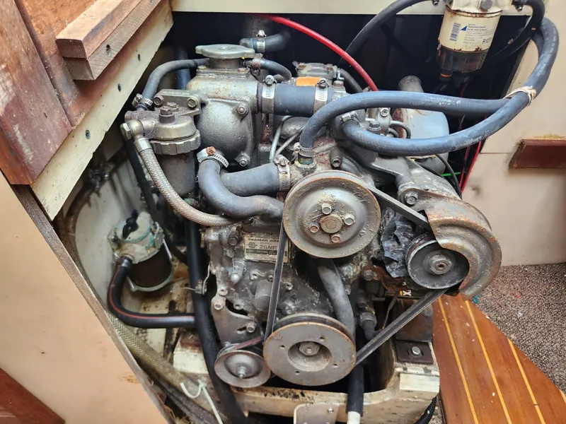 Slide: The Image of 1984 S2 9.2 boat engine in a wooden compartment. - 44