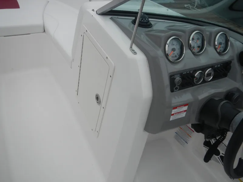 Slide: The Image of 2012 Chaparral 19 H2O Sport boat dashboard and cockpit area. - 5