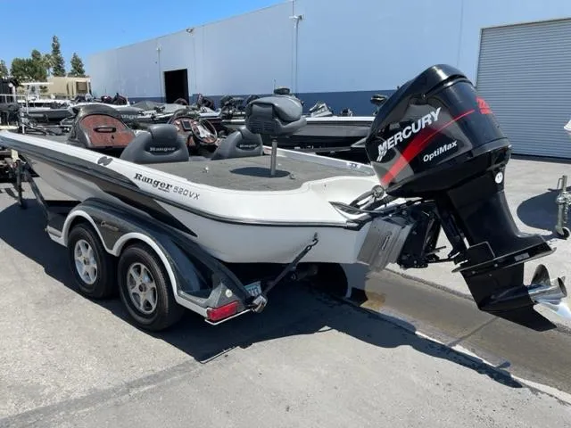 Slide: The Image of 2004 Ranger 520 VX/VS boat with Mercury engine on trailer. - 2