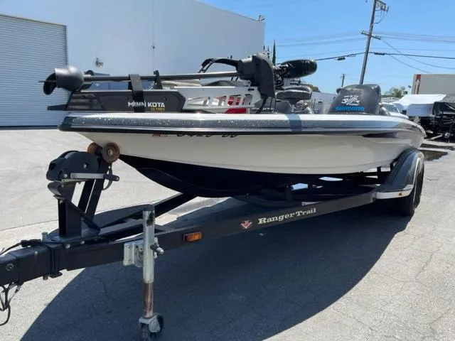 Slide: The Image of 2004 Ranger 520 VX/VS boat on trailer outdoors. - 6