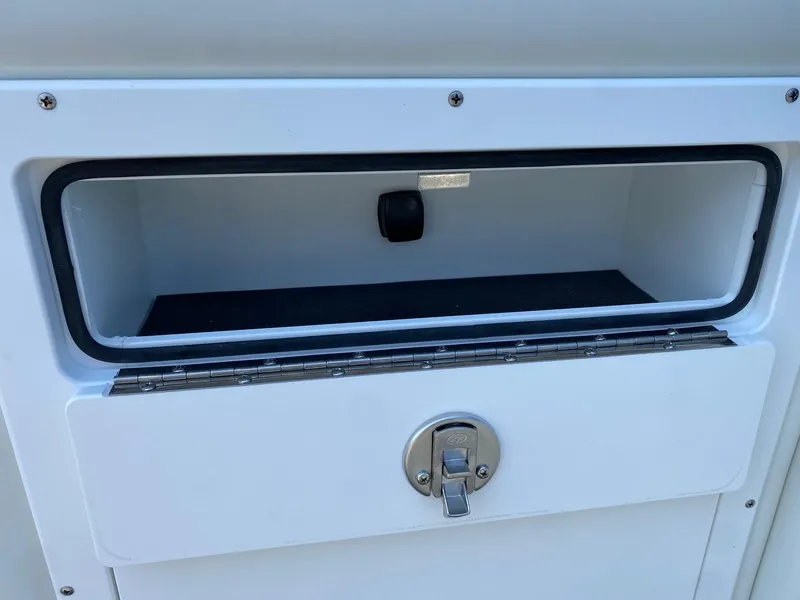 Slide: The Image of Storage compartment on 2024 JC NEPTOON SPORT 21TT boat. - 10