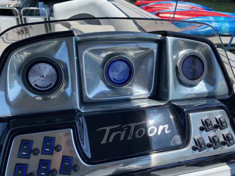 Slide: The Image of Dashboard of 2024 JC NEPTOON SPORT 21TT pontoon boat with gauges and controls. - 16