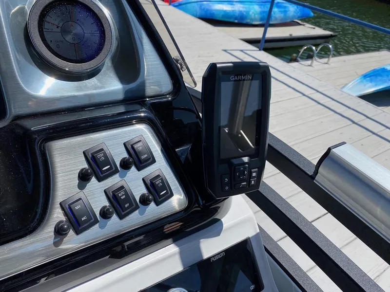 Slide: The Image of Control panel of 2024 JC NEPTOON SPORT 21TT boat with Garmin navigation system. - 18