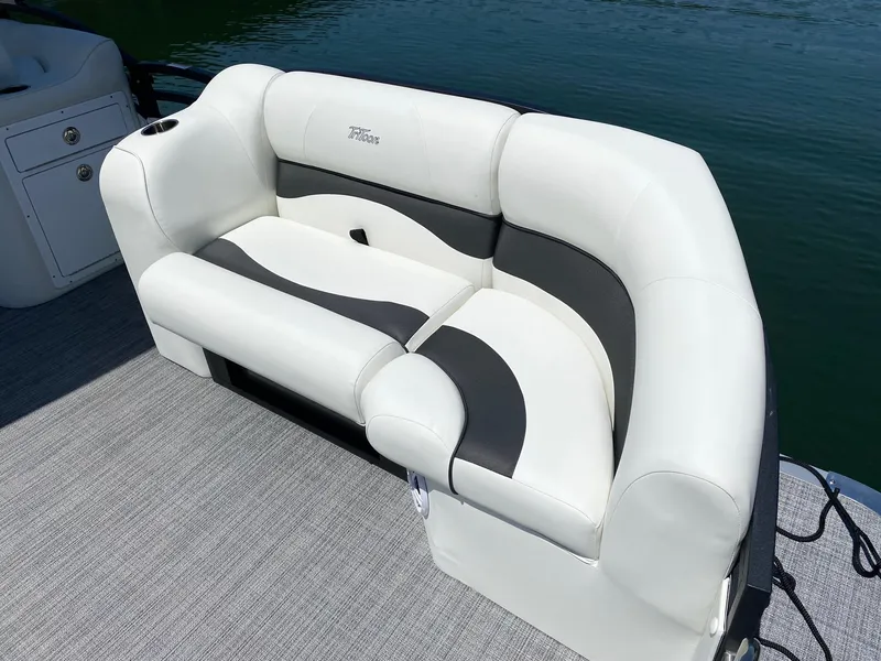 Slide: The Image of 2024 JC NEPTOON SPORT 21TT boat with white and gray cushioned seating. - 3