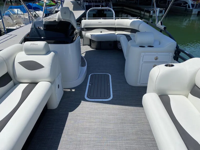 Slide: The Image of 2024 JC NEPTOON SPORT 21TT pontoon boat interior with luxurious seating and modern design. - 5
