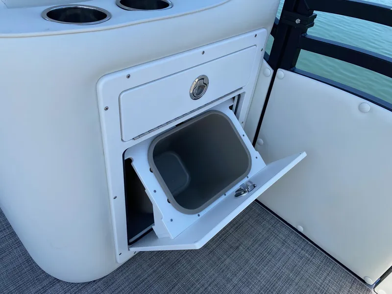 Slide: The Image of Built-in storage compartment on the 2024 JC NEPTOON SPORT 21TT boat. - 9