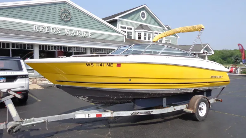 The Image of 2007 Monterey 214 FS yellow boat on trailer at Reed's Marine. - 0