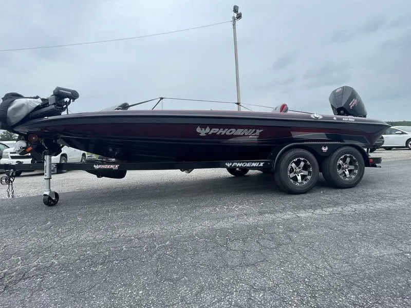 The Image of 2024 Phoenix 920 Elite boat on trailer, side view. - 1