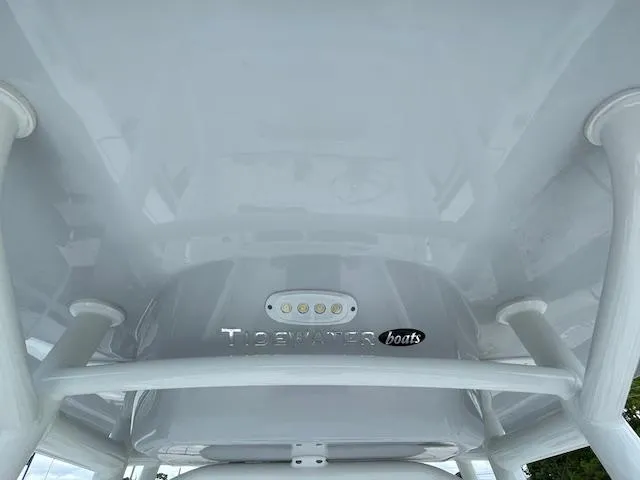 Slide: The Image of 2024 Tidewater 210 LXF boat canopy with integrated lighting. - 23