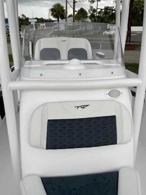 Slide: The Image of 2024 Tidewater 210 LXF boat interior with sleek seating and modern design. - 8