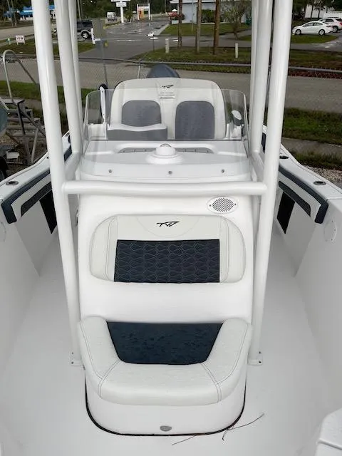 Slide: The Image of 2024 Tidewater 210 LXF boat interior with sleek seating and modern design. - 9