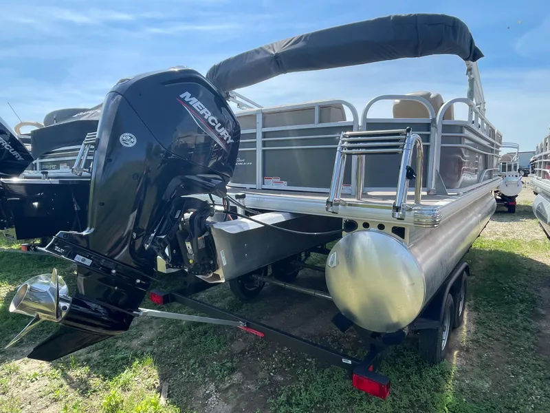 Slide: The Image of 2021 Sun Tracker Party Barge 20 DLX pontoon boat with Mercury outboard motor. - 2
