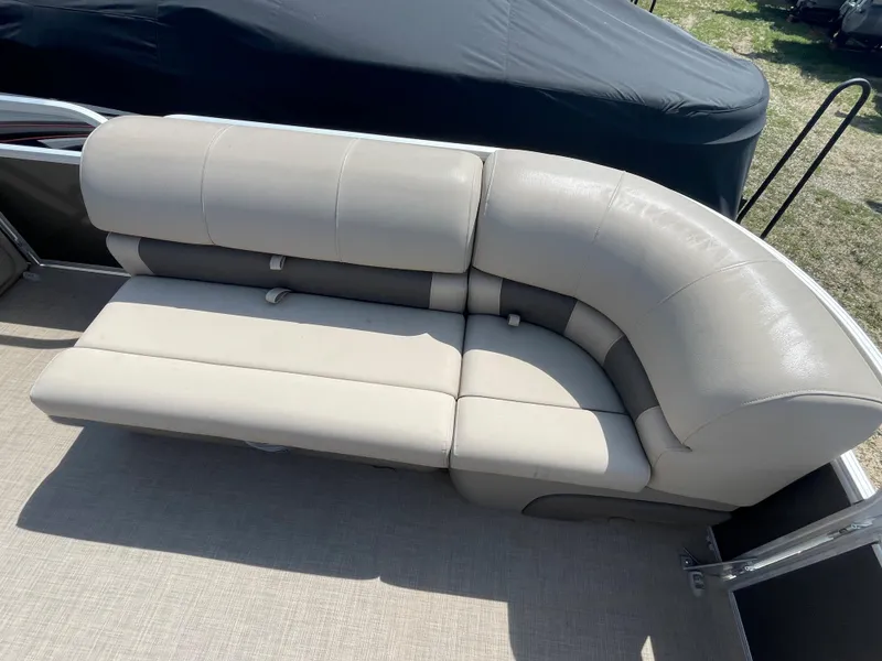 Slide: The Image of 2021 Sun Tracker Party Barge 20 DLX pontoon boat seating area. - 4