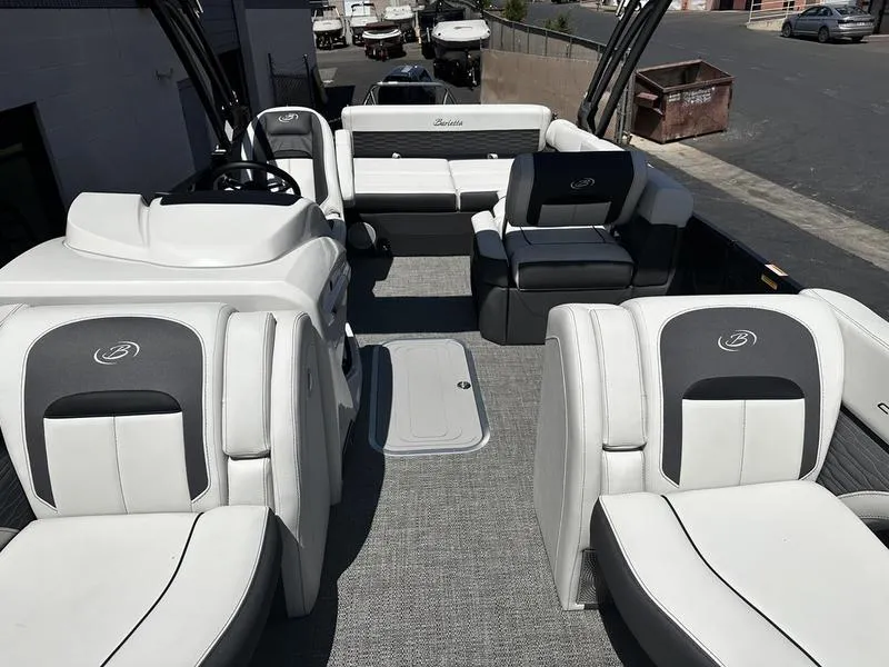 Slide: The Image of 2023 Barletta 23UA pontoon boat with luxurious seating and modern design. - 15