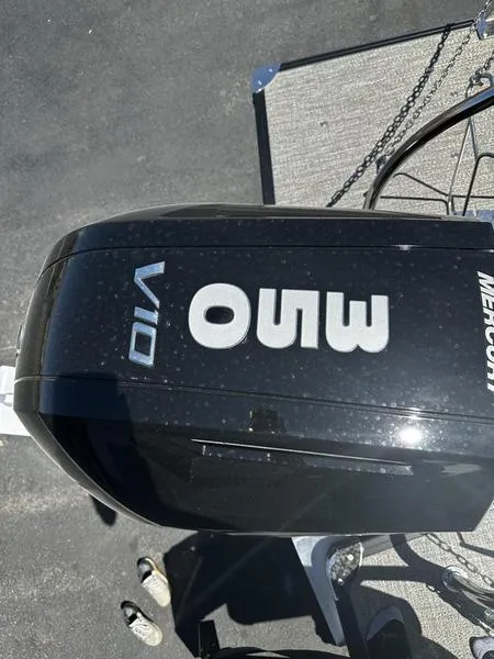 Slide: The Image of 2023 Barletta 23UA boat with a Mercury V10 outboard motor. - 18