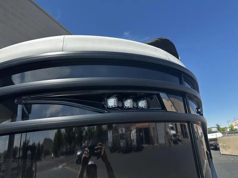 Slide: The Image of 2023 Barletta 23UA boat front view with LED lights. - 7