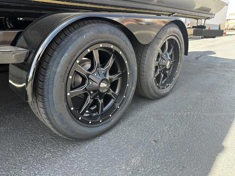 Slide: The Image of 2023 Barletta 23UA trailer with black alloy wheels. - 9