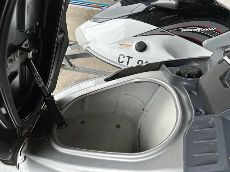 Slide: The Image of 2009 Yamaha WaveRunner FX Cruiser H/O with open storage compartment. - 10