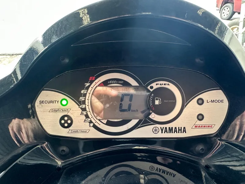 Slide: The Image of 2009 Yamaha WaveRunner FX Cruiser H/O dashboard with digital display and controls. - 23