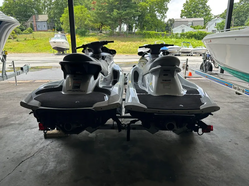 Slide: The Image of 2009 Yamaha WaveRunner FX Cruiser H/O jet skis on a trailer in a garage. - 6